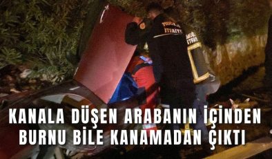 Kanala düşen arabanın içinden burnu bile kanamadan çıktı