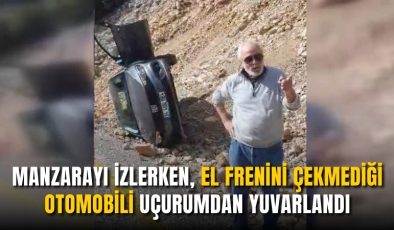 Manzarayı izlerken, el frenini çekmediği otomobili uçurumdan yuvarlandı